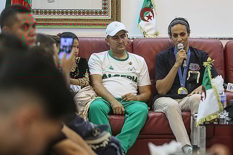 Algeria's Olympic gold medalist Imane Khelif speaks to the media